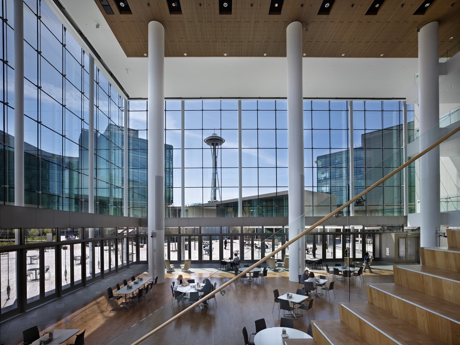 Atrium interior with coffee bar and seating for employees and their guests.,,,,Photographer: Benjamin Benschneider, April 2011